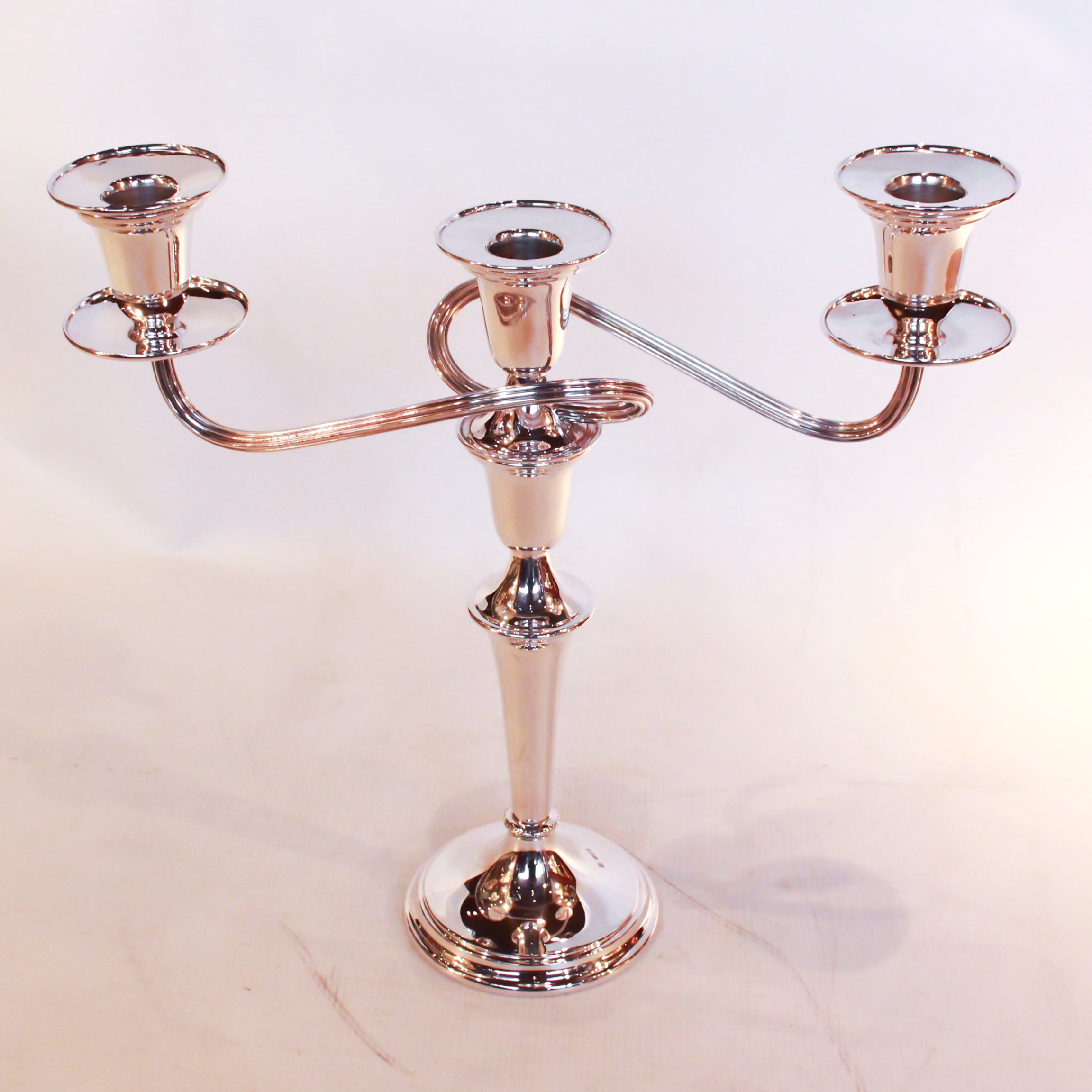 A pair of Silver Candelabra