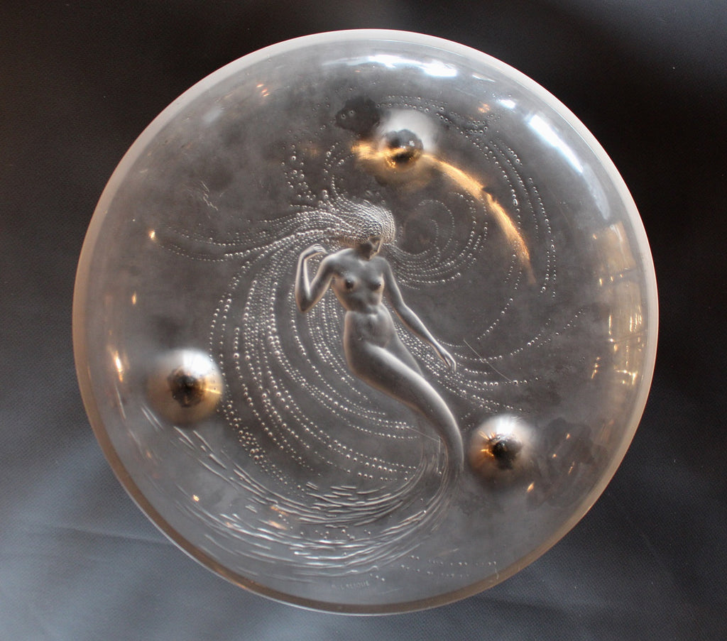 Sirene Coupe  an Art Deco ‘trepied’ glass coupe by Lalique Glass of frosted glass with raised opalescent design in the form of a mermaid frolicking in swirling waters set on three raised feet.