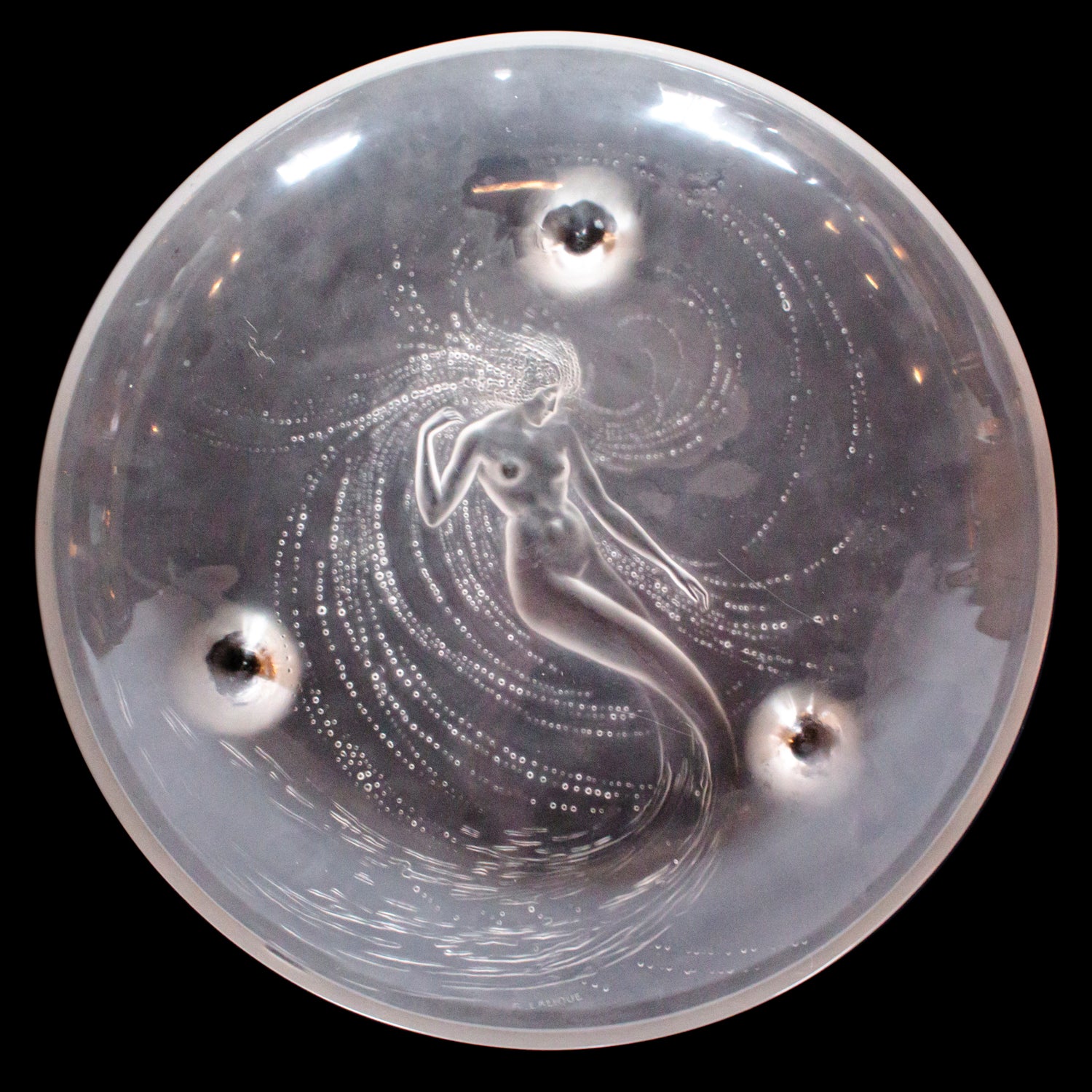 Sirene Coupe  an Art Deco ‘trepied’ glass coupe by Lalique Glass of frosted glass with raised opalescent design in the form of a mermaid frolicking in swirling waters set on three raised feet.