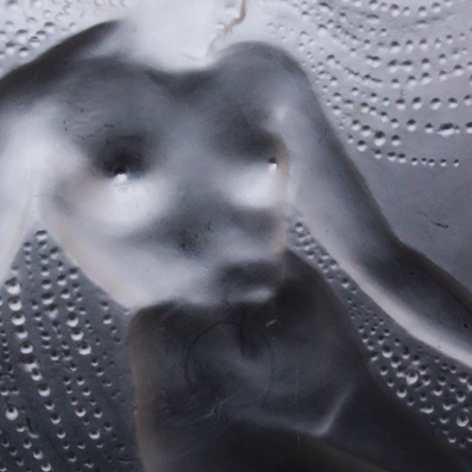 Sirene Coupe  an Art Deco ‘trepied’ glass coupe by Lalique Glass of frosted glass with raised opalescent design in the form of a mermaid frolicking in swirling waters set on three raised feet.