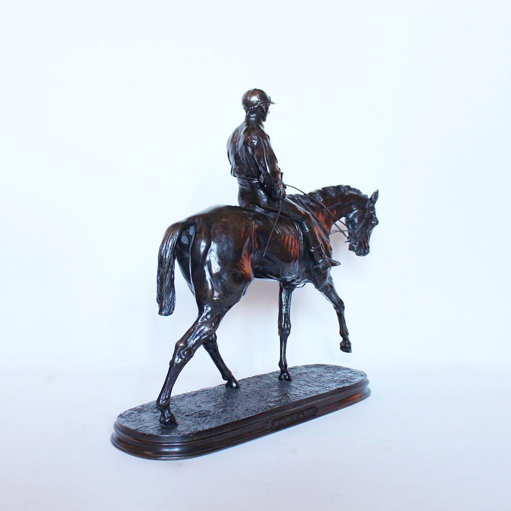 Vainqueur du Derby, a patinated bronze jockey on his horse by Pierre-Jules Mene at Jeroen Markies