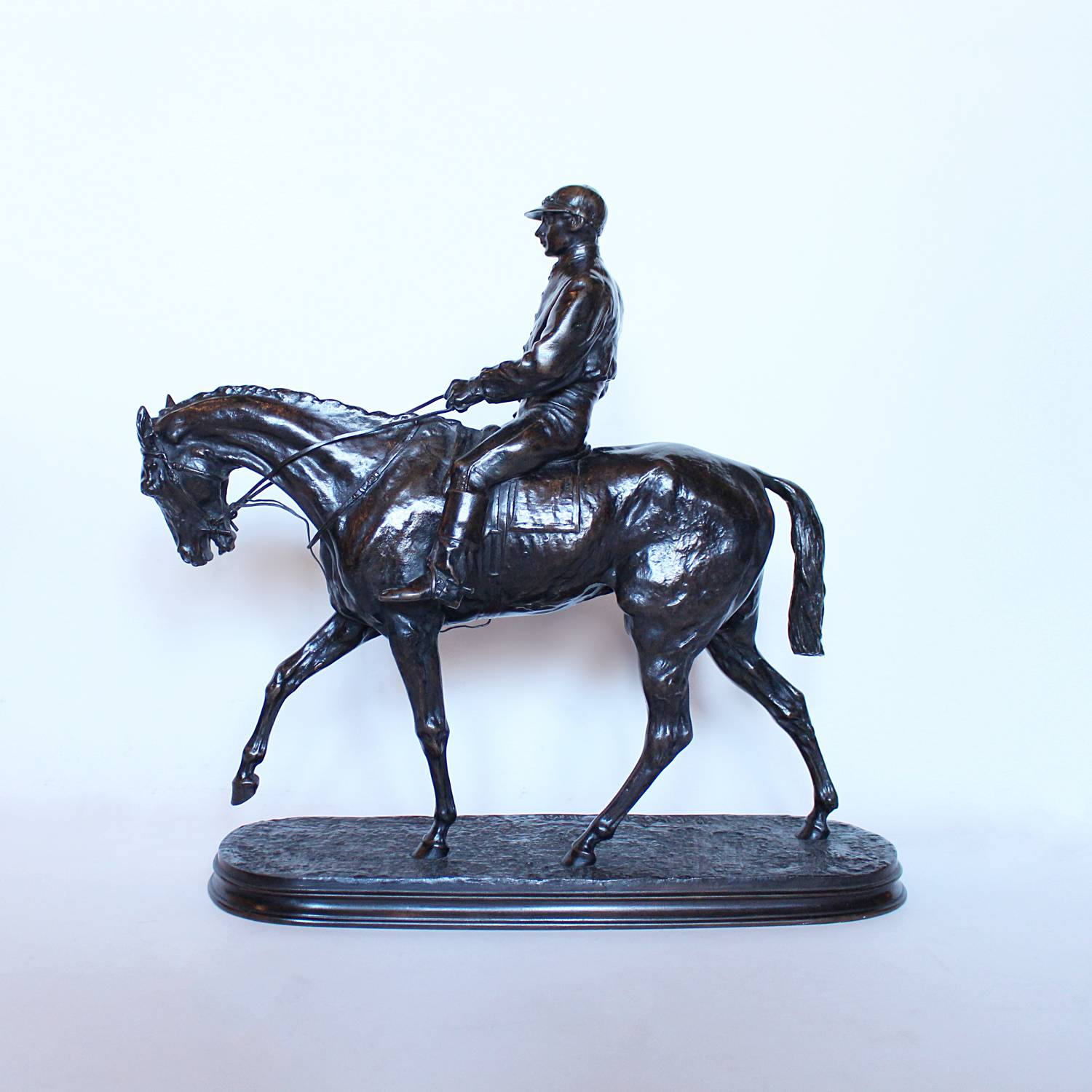 Vainqueur du Derby, a patinated bronze jockey on his horse by Pierre-Jules Mene at Jeroen Markies