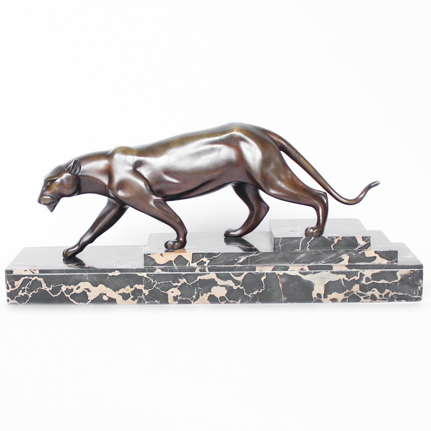 An Art Deco, patinated bronze study of a prowling panther, set over an integral marble base. Signed H Molins to marble and cast and stamped with foundry mark to cast at Jeroen Markies