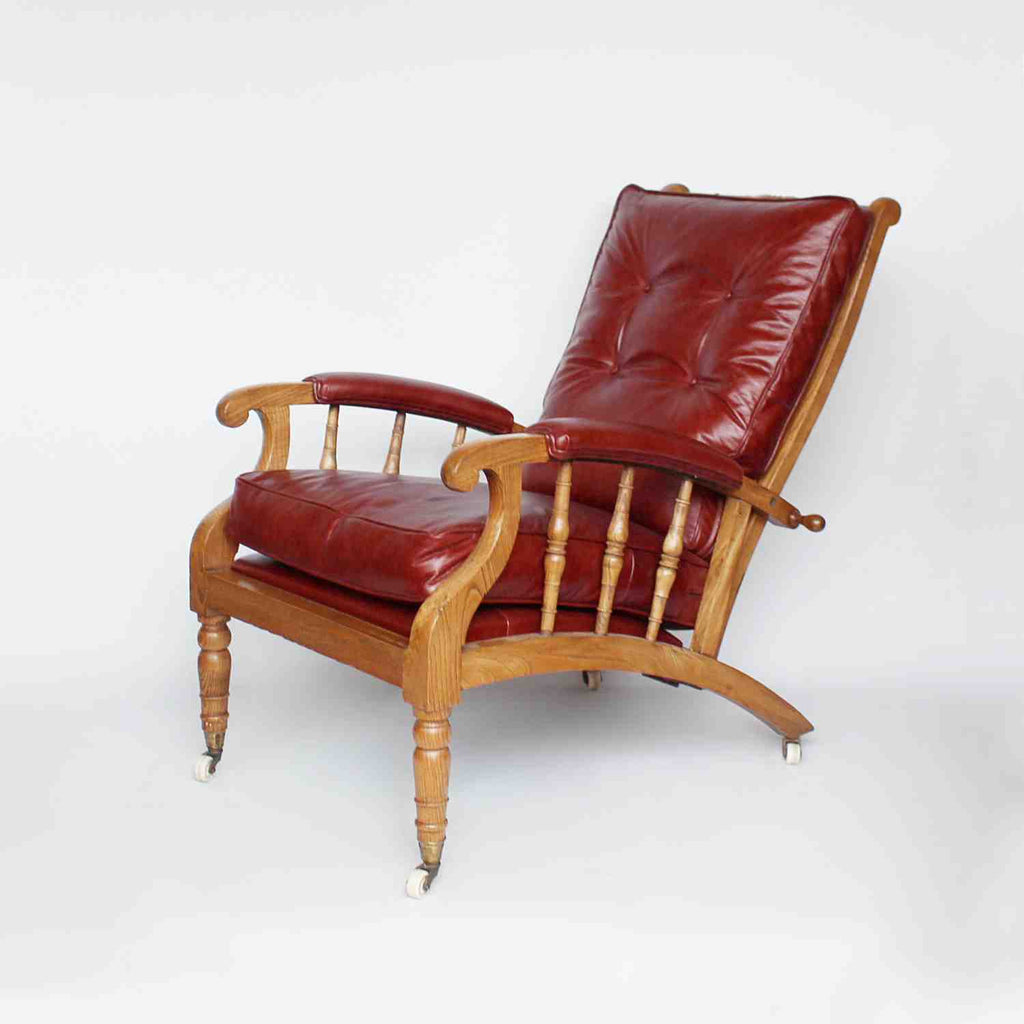 A pair of Philip Webb Arts & Crafts reclining armchairs circa 1900