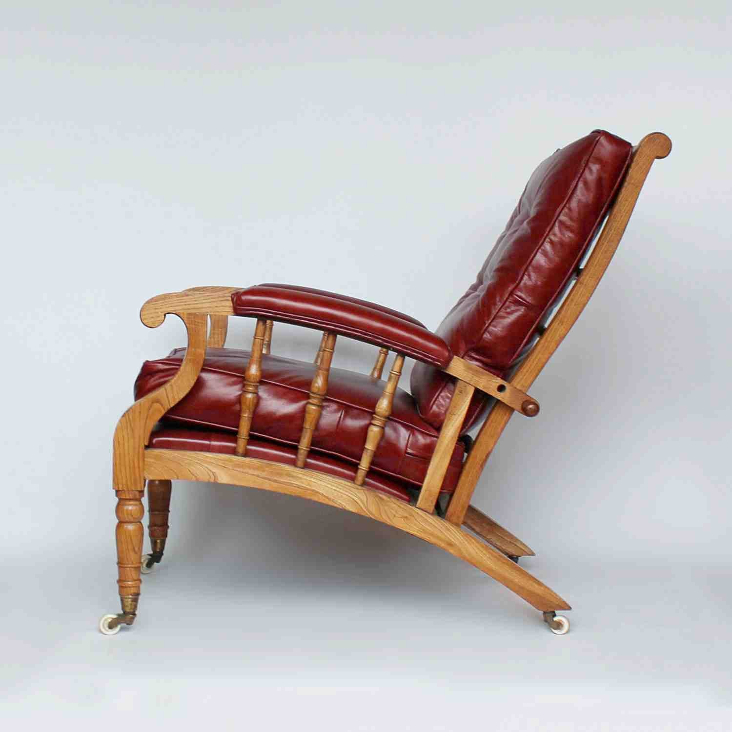 A pair of Philip Webb Arts & Crafts reclining armchairs circa 1900