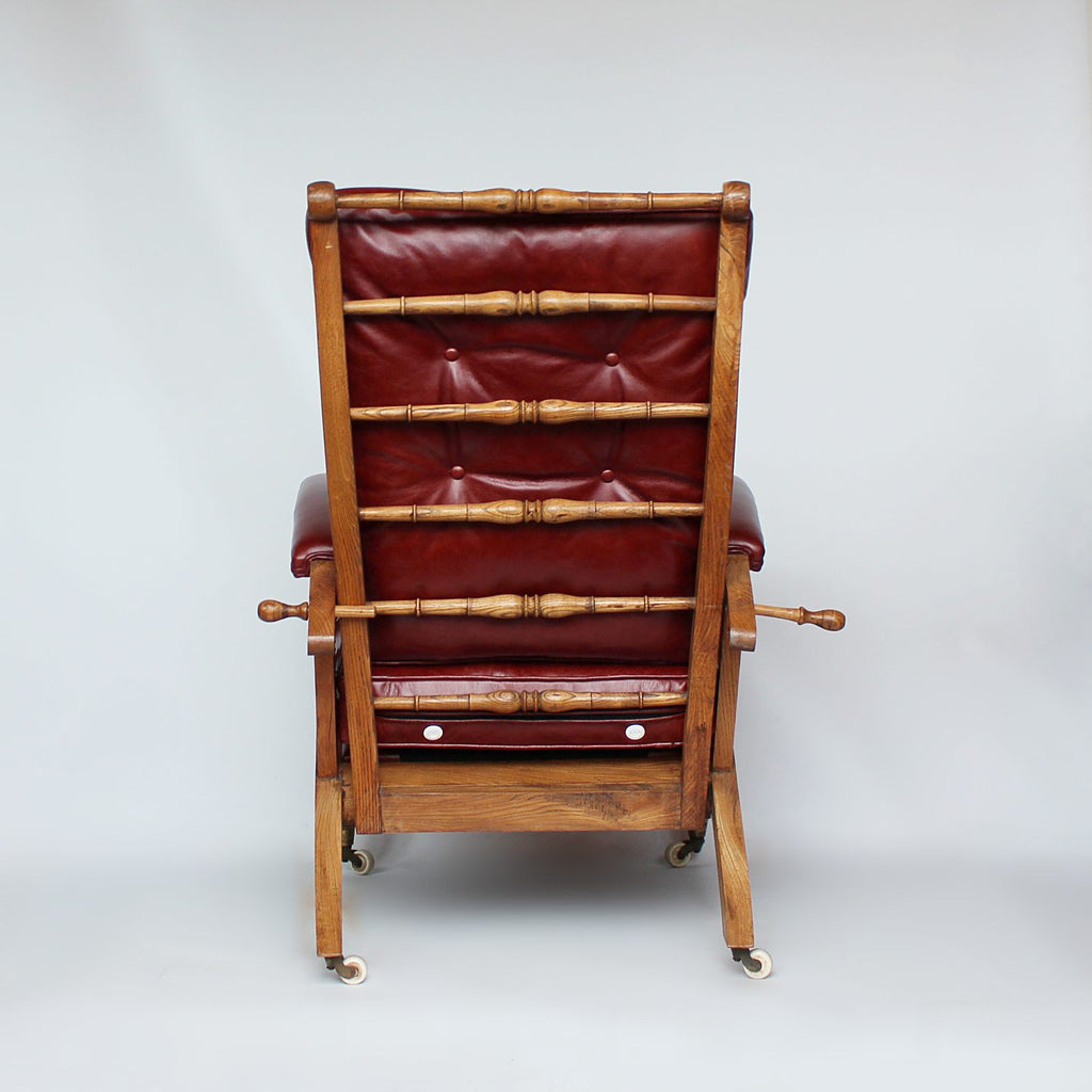 A pair of Philip Webb Arts & Crafts reclining armchairs circa 1900