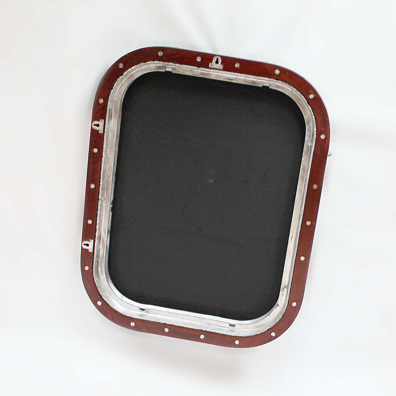 Art Deco porthole transformed into opening mirror at Jeroen Markies