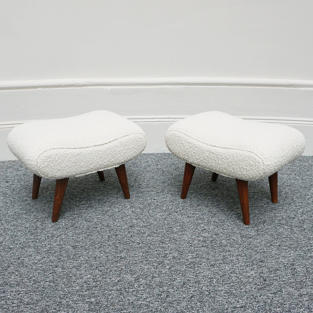 A Pair of Mid Century Footstools  re-upholstered in white Bouclé with tapered teak feet
