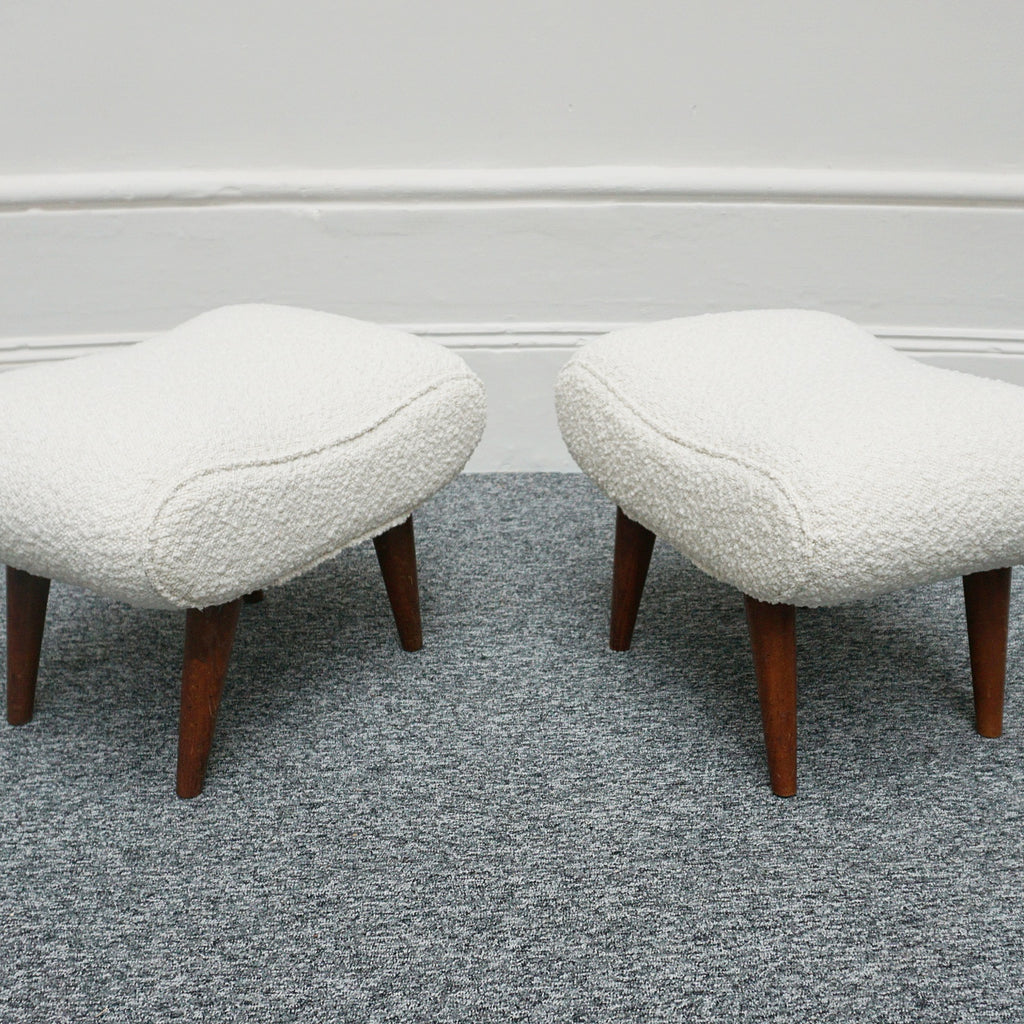  A Pair of Mid Century Footstools  re-upholstered in white Bouclé with tapered teak feet