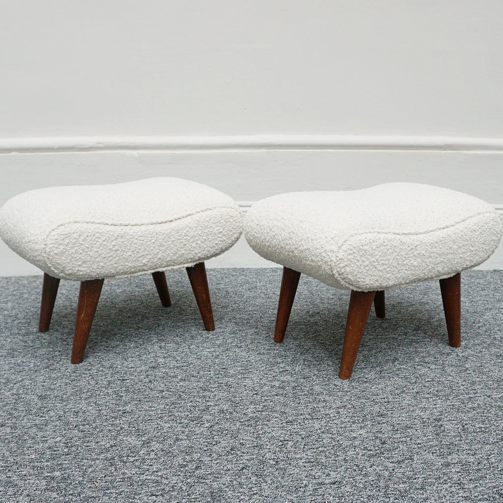  A Pair of Mid Century Footstools  re-upholstered in white Bouclé with tapered teak feet
