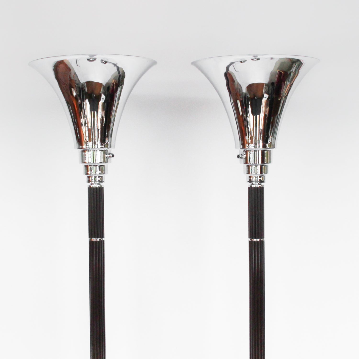 Art Deco uplighter floor lamps with brown bakelite stems at Jeroen Markies