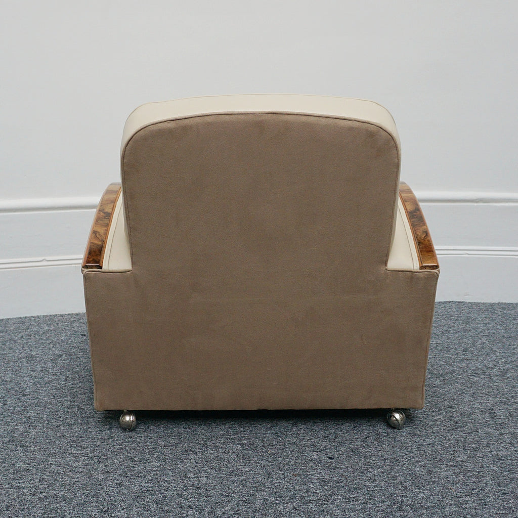 An Art Deco three piece tank suite by Heals of london. Made of Burr and solid walnut banding with reeded lower section, Upholstered in cream leather and contrasting faux suede