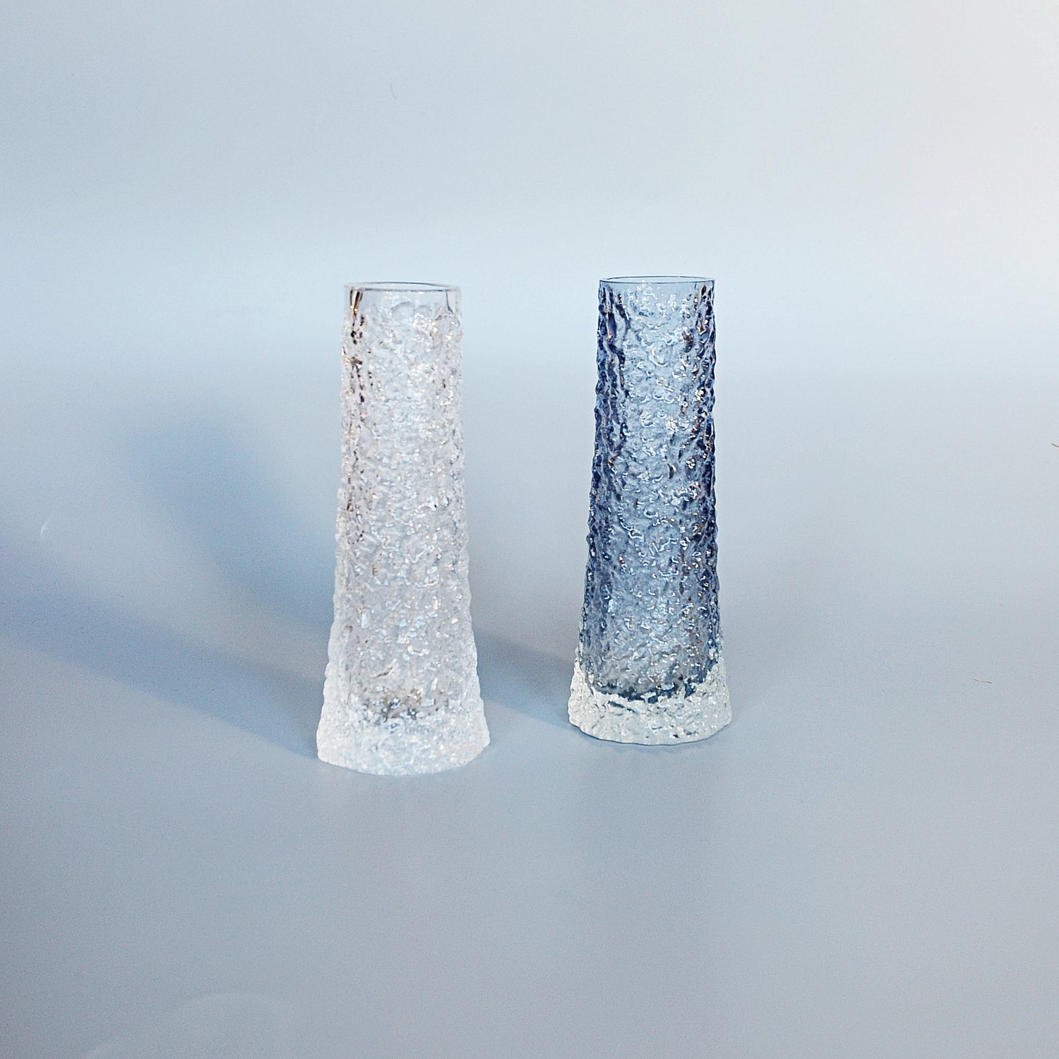 Collection of Twelve Textured 'Chimney' Bark Vases