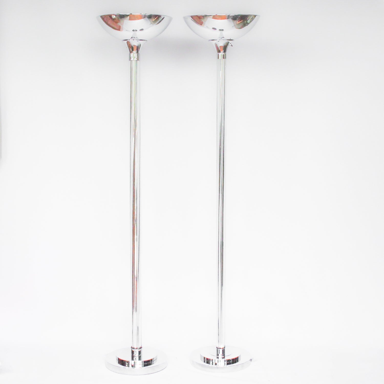 An Art Deco, matched pair of uplighter lamps. Fully refurbished, re-wired and re-chromed. Some replacement parts at Jeroen Markies.