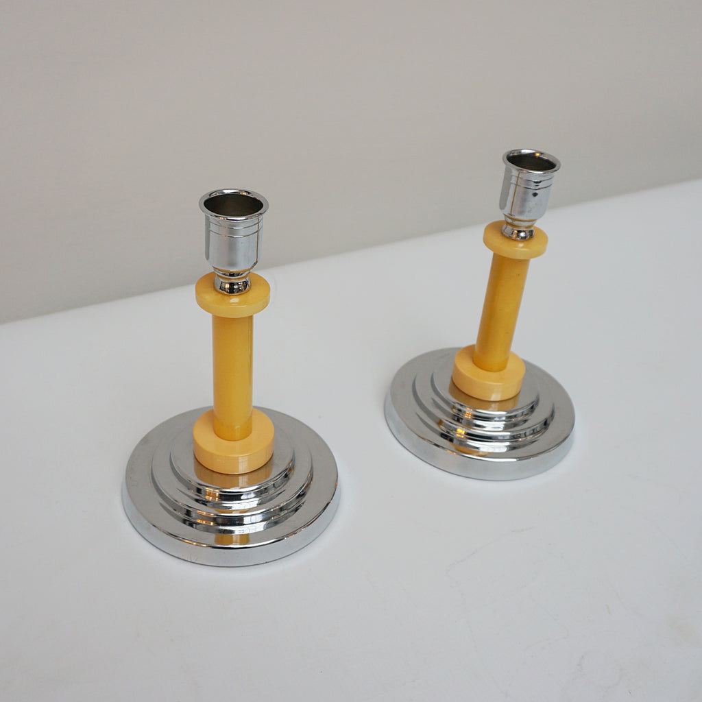 A pair of Art Deco candlesticks. Yellow bakelite stem with dual bakelite rings. Jeroen Markies Art Deco