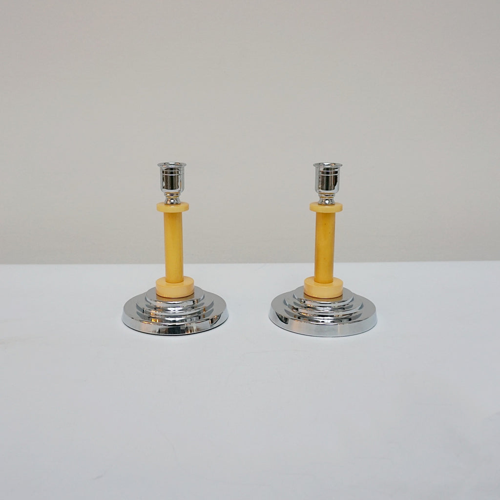 A pair of Art Deco candlesticks. Yellow bakelite stem with dual bakelite rings. Jeroen Markies Art Deco