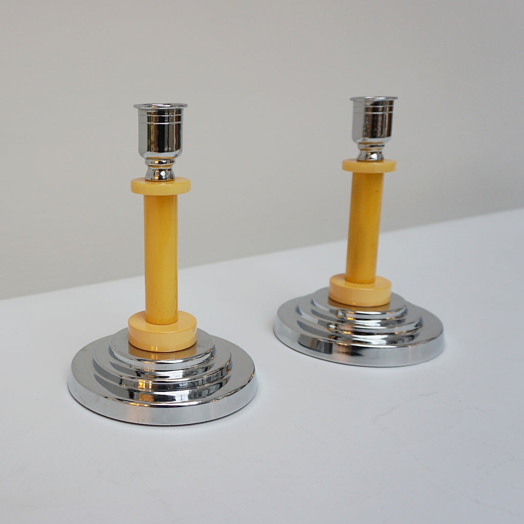 A pair of Art Deco candlesticks. Yellow bakelite stem with dual bakelite rings. Jeroen Markies Art Deco