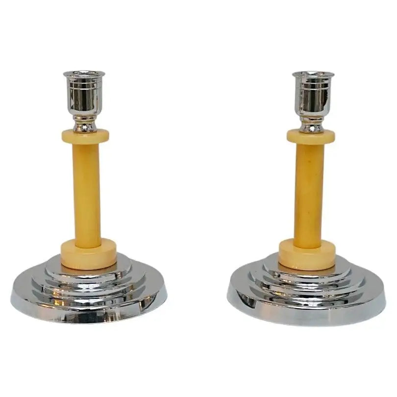 A pair of Art Deco candlesticks. Yellow bakelite stem with dual bakelite rings. Jeroen Markies Art Deco